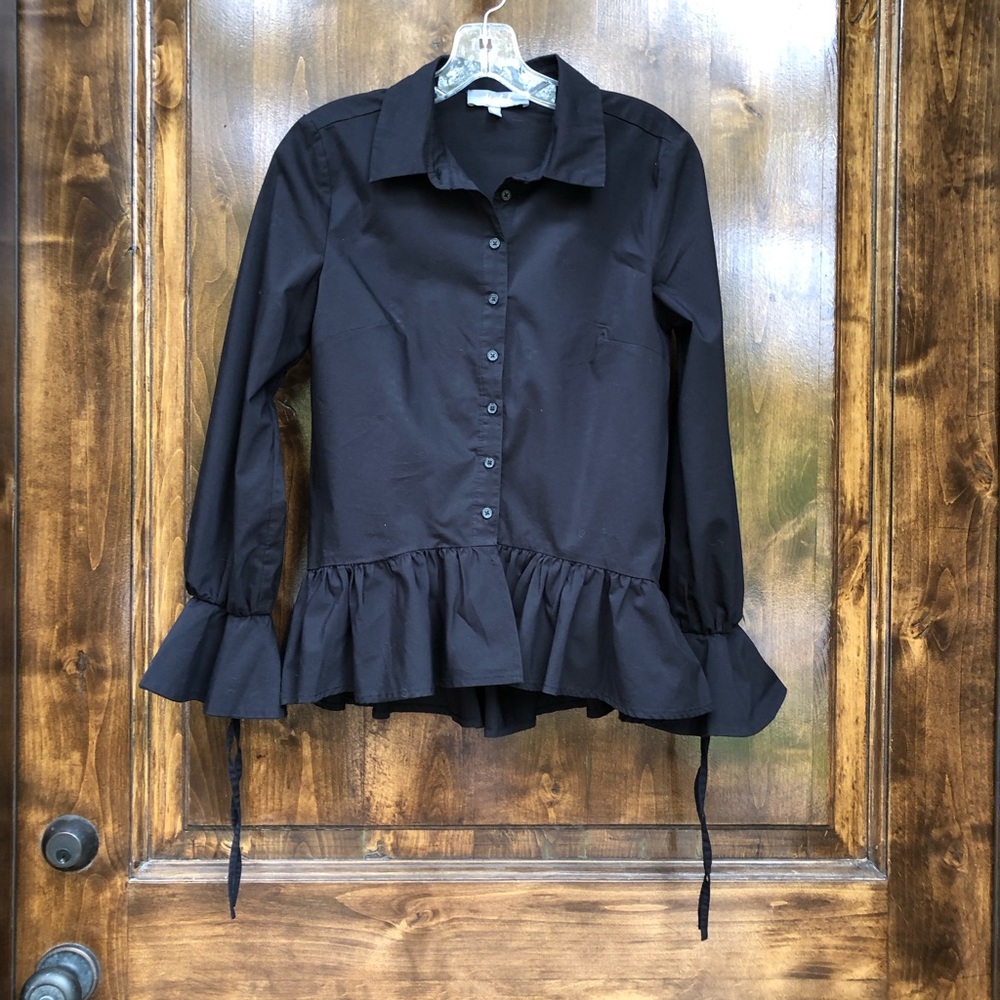 Women’s black blouse. Great for Halloween. Size S. Hem hangs longer in back.